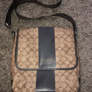 Large Coach crossbody bag.